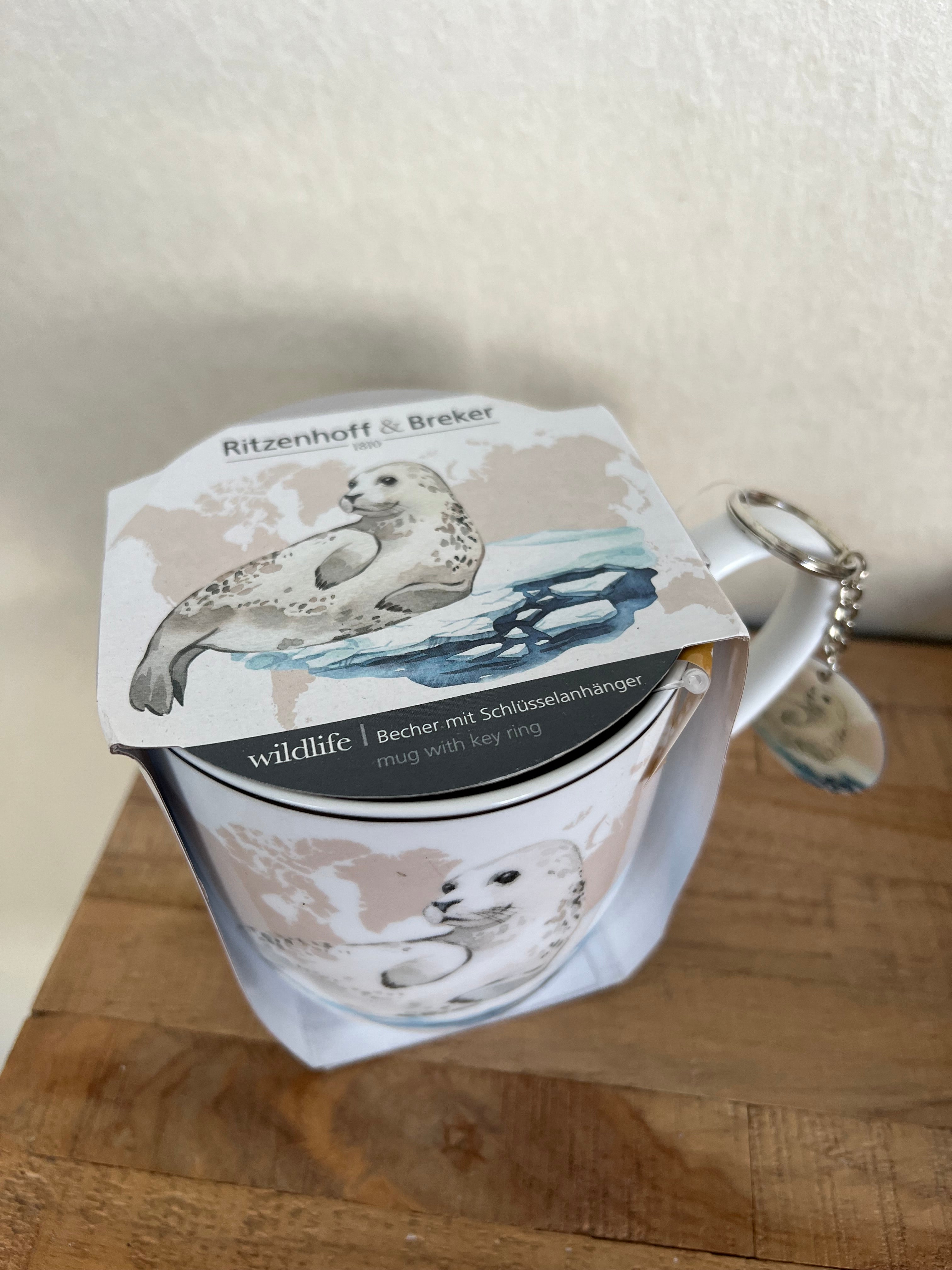 Ritzenhoff & Breker Tasse mit Robbe + Schlüsselanhänger